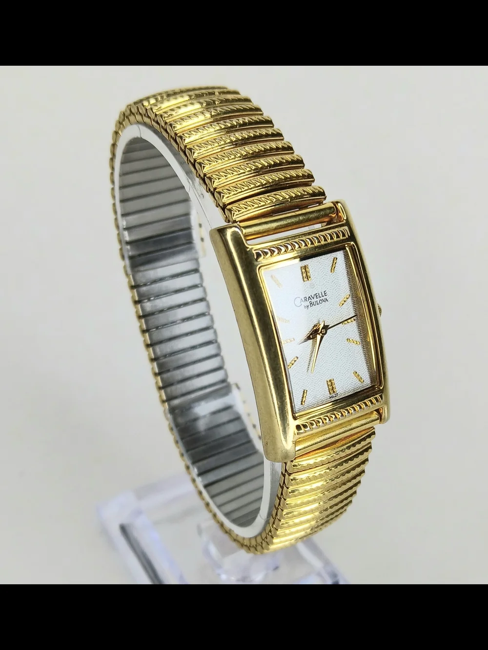 ​Vintage Caravelle Bulova Womens Rectangular Gold Tone Dress Watch 2003 A3